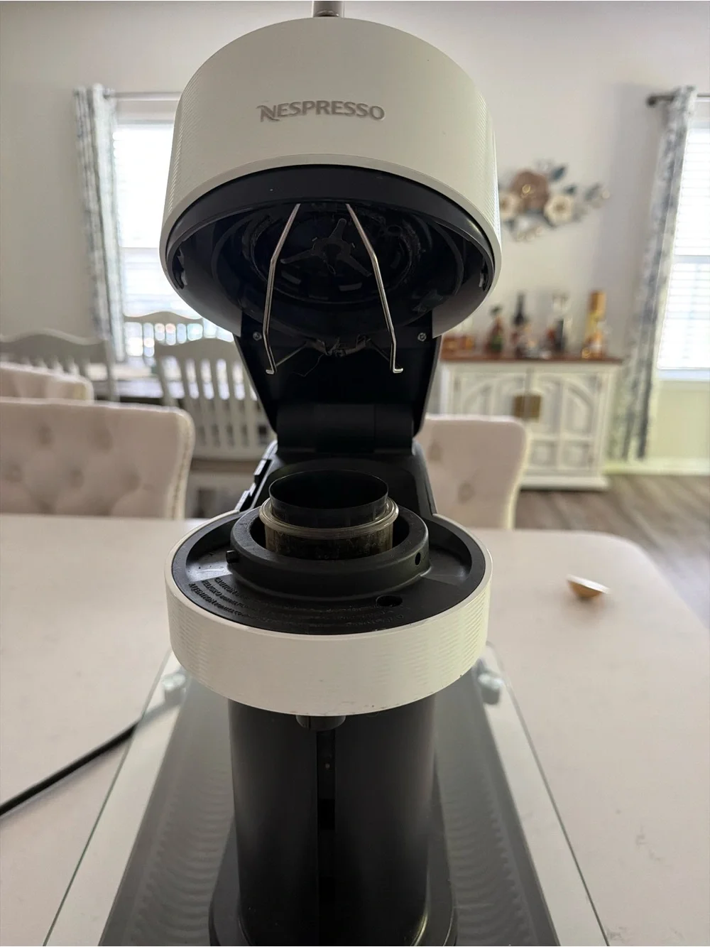 Nespresso Capsule Espresso Machine in White and Black & pod holder